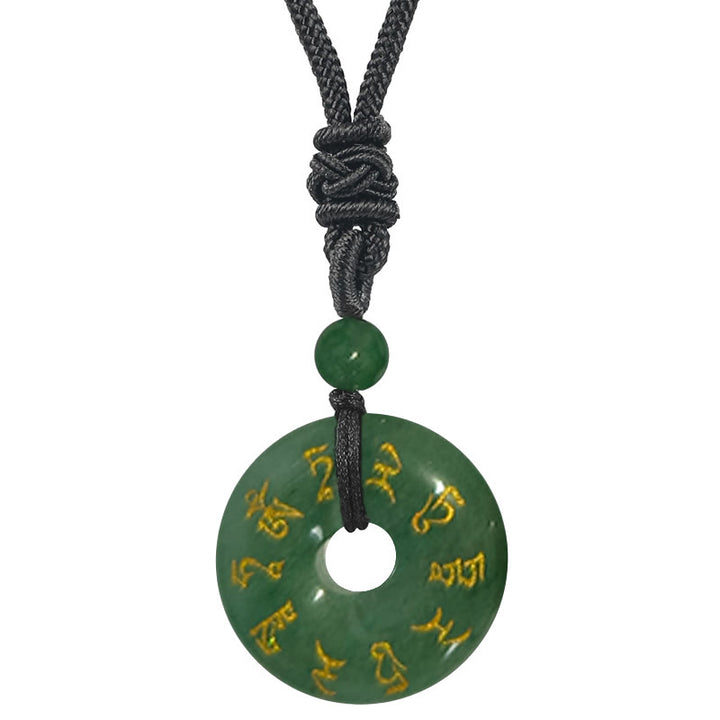 Collar con colgante de obsidiana negra con cristales naturales de varios tipos y Buddha Stones con mantra de Tara verde