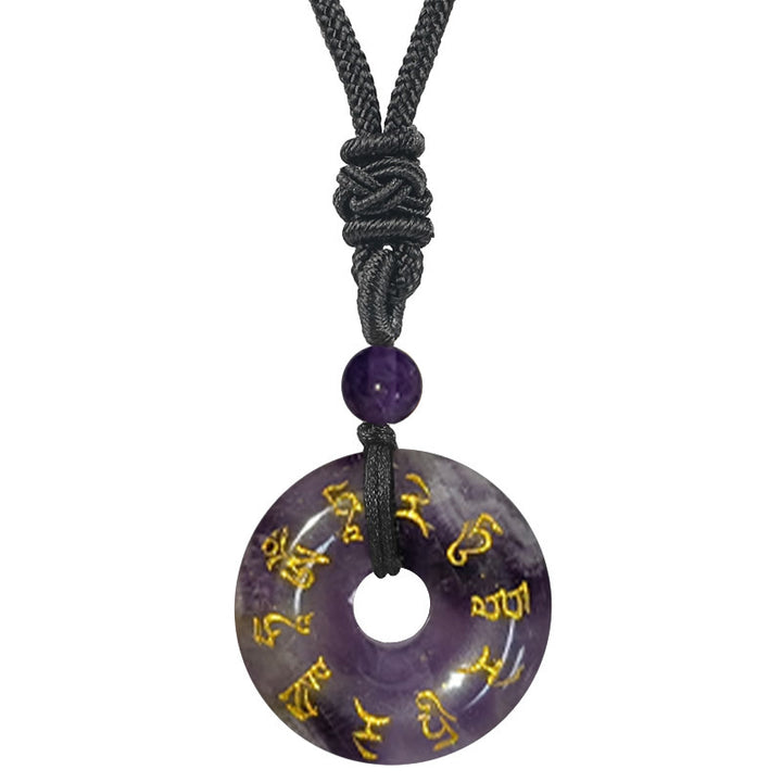 Collar con colgante de obsidiana negra con cristales naturales de varios tipos y Buddha Stones con mantra de Tara verde