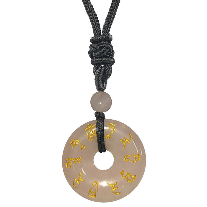 Collar con colgante de obsidiana negra con cristales naturales de varios tipos y Buddha Stones con mantra de Tara verde