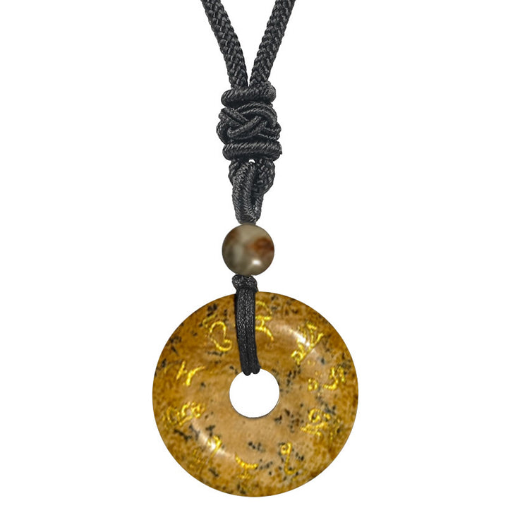 Collar con colgante de obsidiana negra con cristales naturales de varios tipos y Buddha Stones con mantra de Tara verde