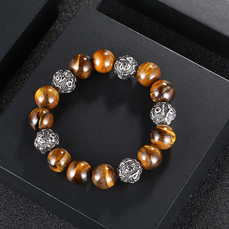 Pulsera curativa Om Mani Padme Hum de seis palabras verdaderas con piedra de lava natural de Buddha Stones y ojo de tigre de acero de titanio