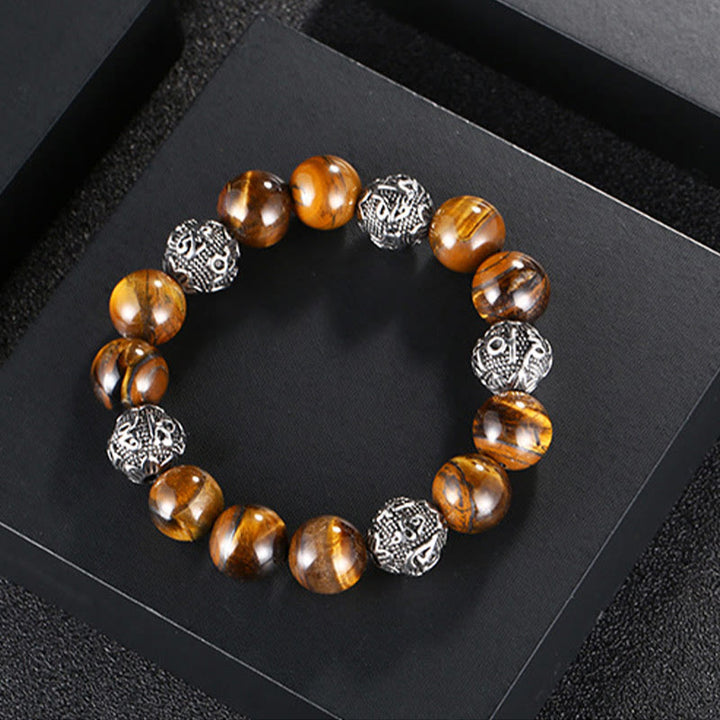 Pulsera curativa Om Mani Padme Hum de seis palabras verdaderas con piedra de lava natural de Buddha Stones y ojo de tigre de acero de titanio