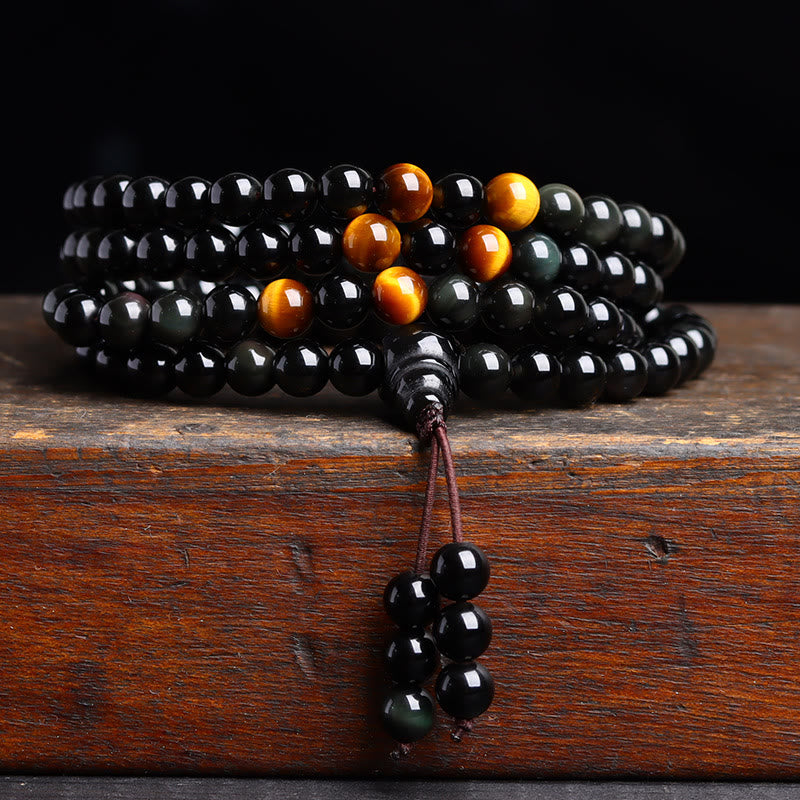 Pulsera de obsidiana negra con 108 cuentas de mala y Buddha Stones