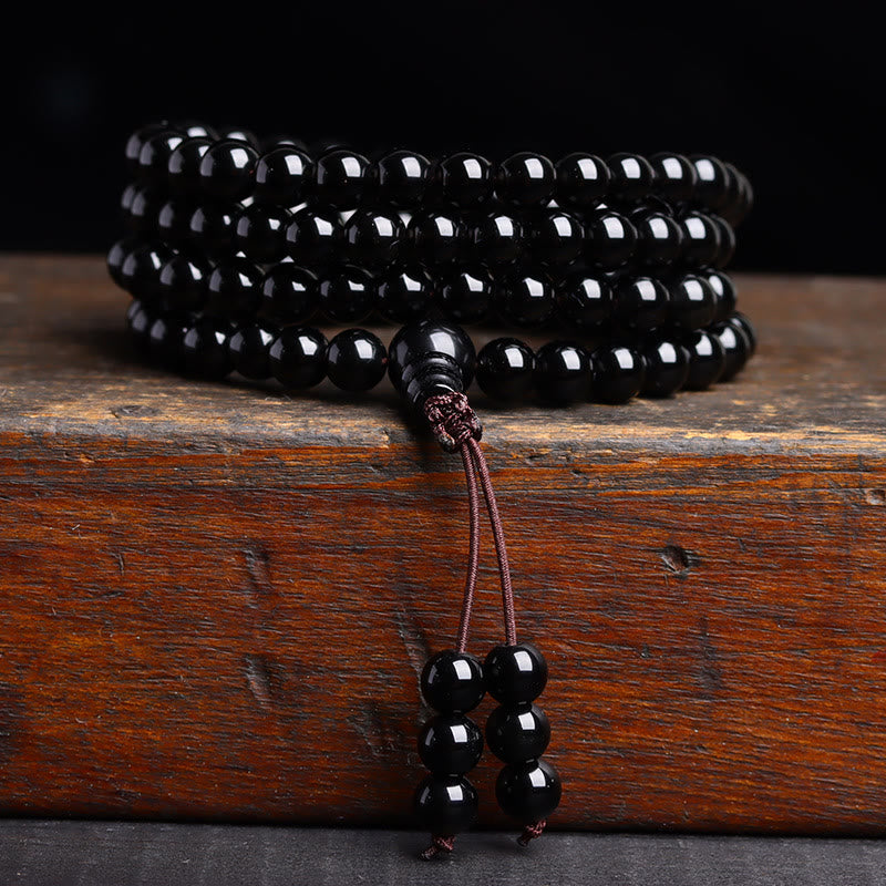 Pulsera de obsidiana negra con 108 cuentas de mala y Buddha Stones
