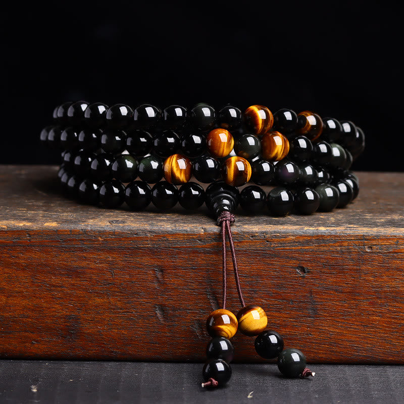 Pulsera de obsidiana negra con 108 cuentas de mala y Buddha Stones