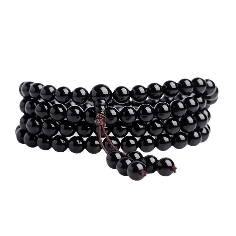 Pulsera de obsidiana negra con 108 cuentas de mala y Buddha Stones