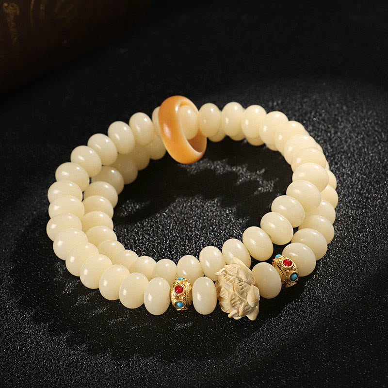 Pulsera de doble vuelta con Buddha Stones de Bodhi y madera de durazno y loto para la riqueza