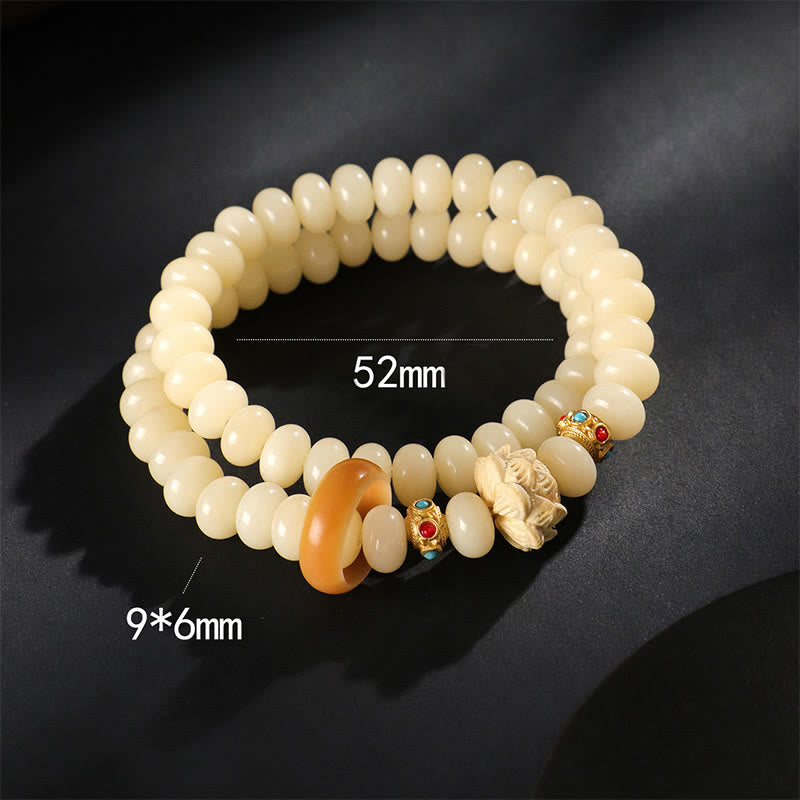 Pulsera de doble vuelta con Buddha Stones de Bodhi y madera de durazno y loto para la riqueza