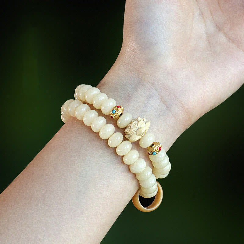 Pulsera de doble vuelta con Buddha Stones de Bodhi y madera de durazno y loto para la riqueza