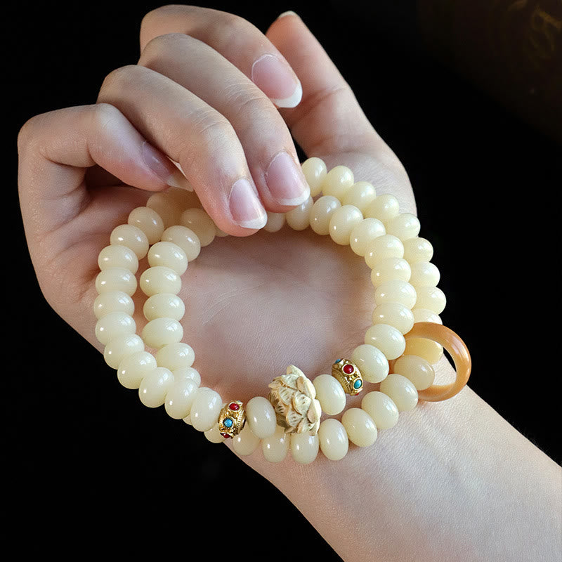 Pulsera de doble vuelta con Buddha Stones de Bodhi y madera de durazno y loto para la riqueza