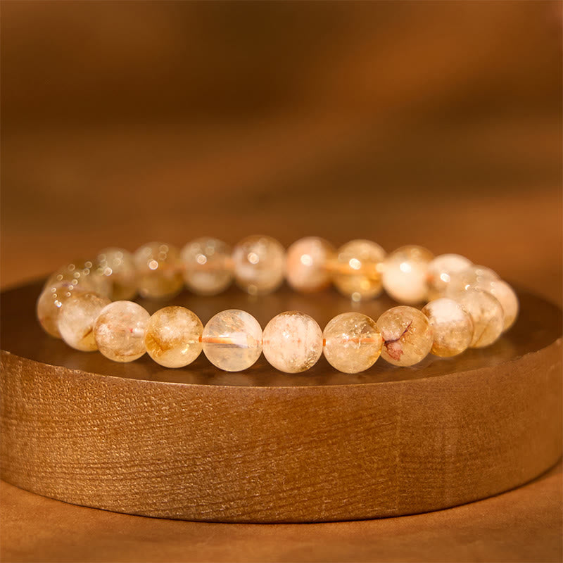 Pulsera de prosperidad con copos de nieve de cristal citrino natural de Buddha Stones