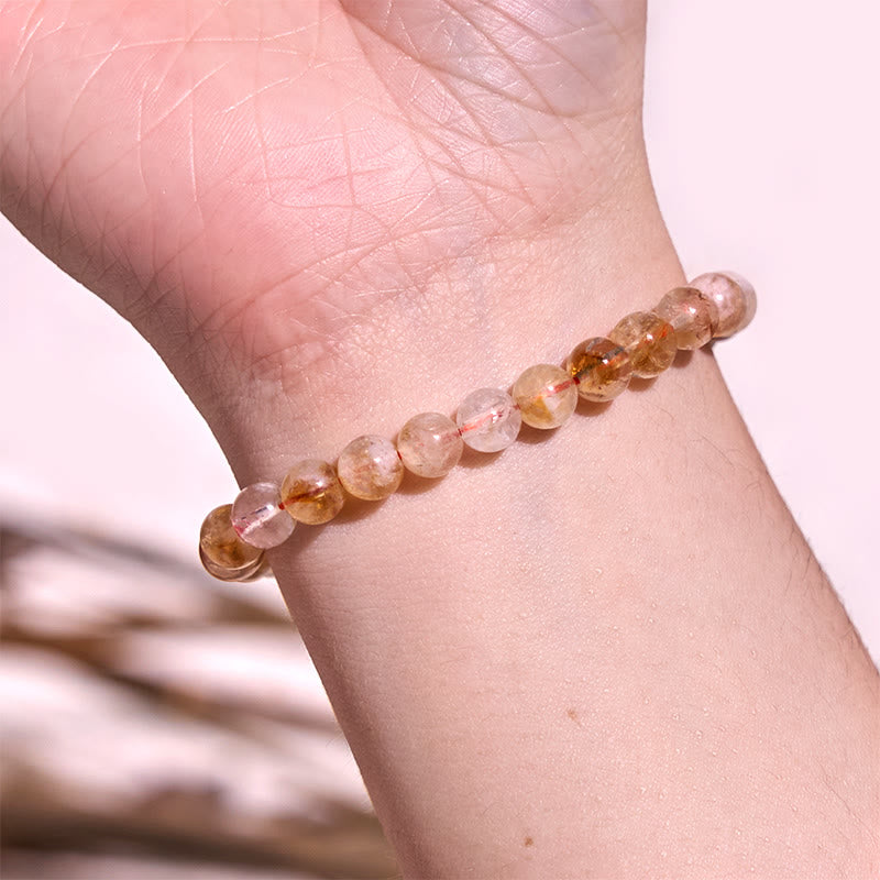 Pulsera de prosperidad con copos de nieve de cristal citrino natural de Buddha Stones