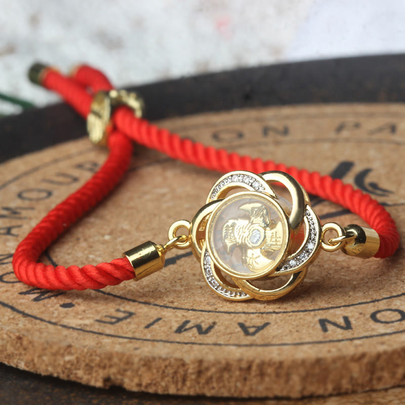 Pulsera trenzada con protección de Qi y Feng Sheng Shui con molino de viento de cobre y latón con hilo rojo ciruela giratorio y Buddha Stones