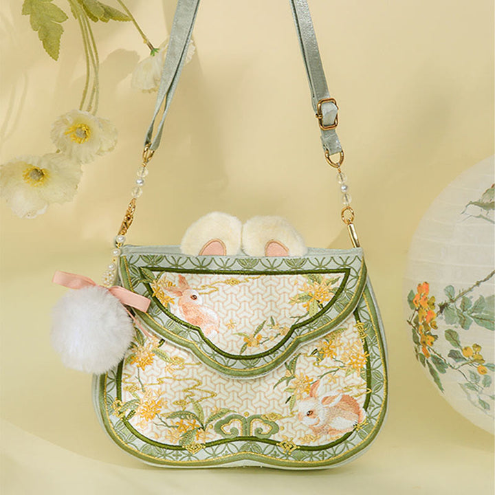Bolso bandolera con borlas y cadena de bolas de pelo y perlas bordadas con conejo de osmanthus y Buddha Stones