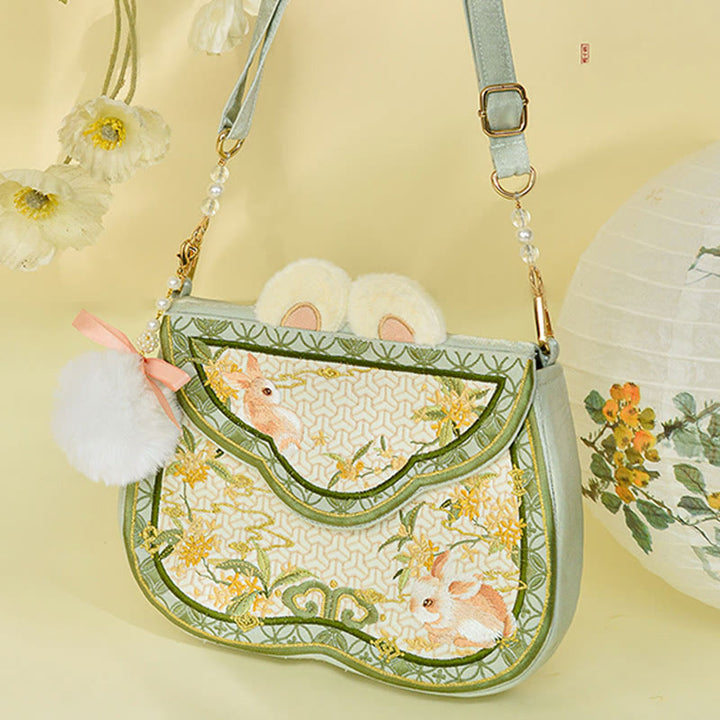 Bolso bandolera con borlas y cadena de bolas de pelo y perlas bordadas con conejo de osmanthus y Buddha Stones