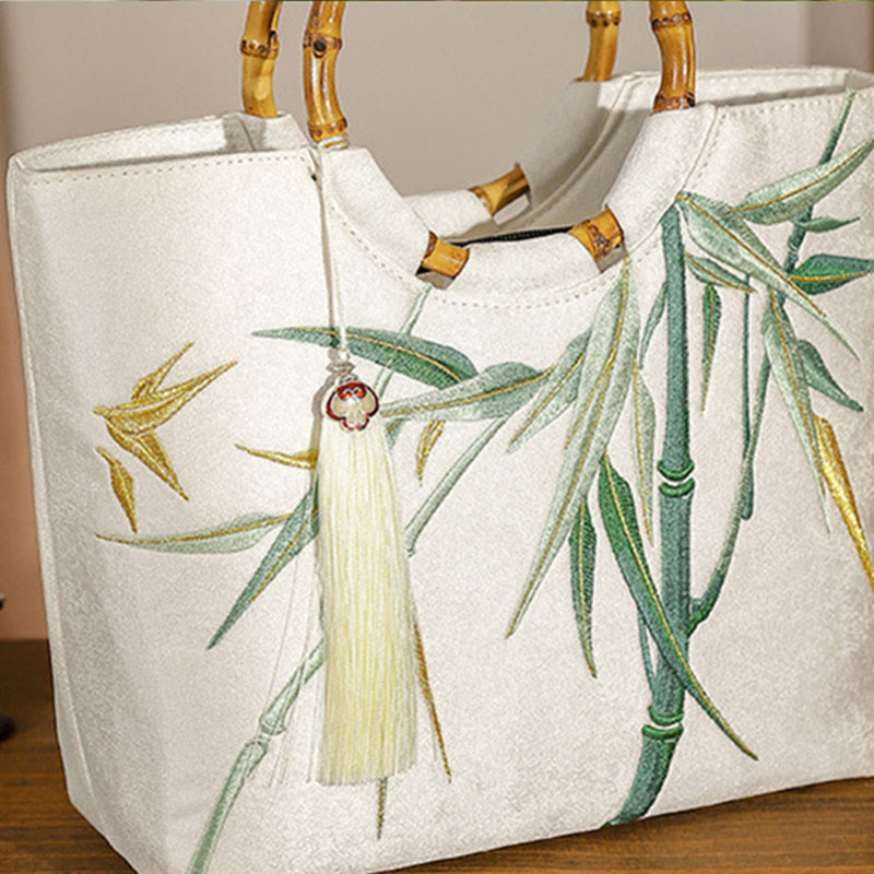 Bolsos de mano con borlas y asas de bambú bordadas con Buddha Stones