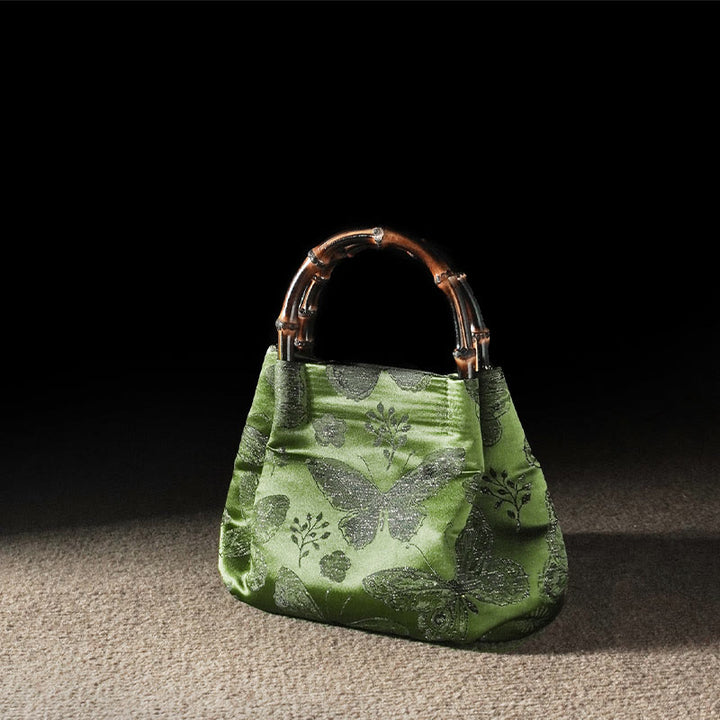 Bolso bandolera con cadena de metal y asa de bambú con diseño de Buddha Stones