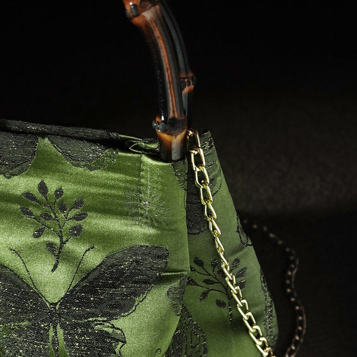 Bolso bandolera con cadena de metal y asa de bambú con diseño de Buddha Stones