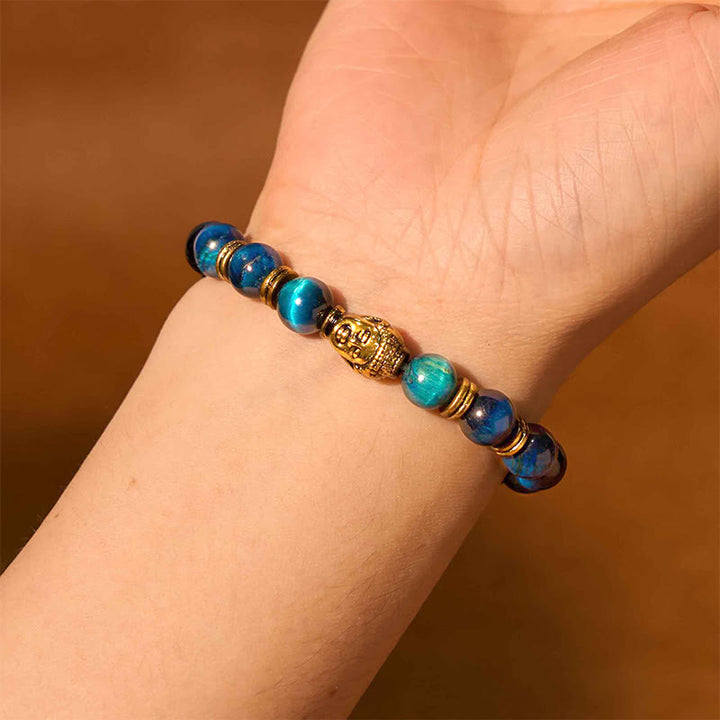 Pulsera de equilibrio con cabeza de Buda y ojo de tigre azul, verde y rojo con Buddha Stones