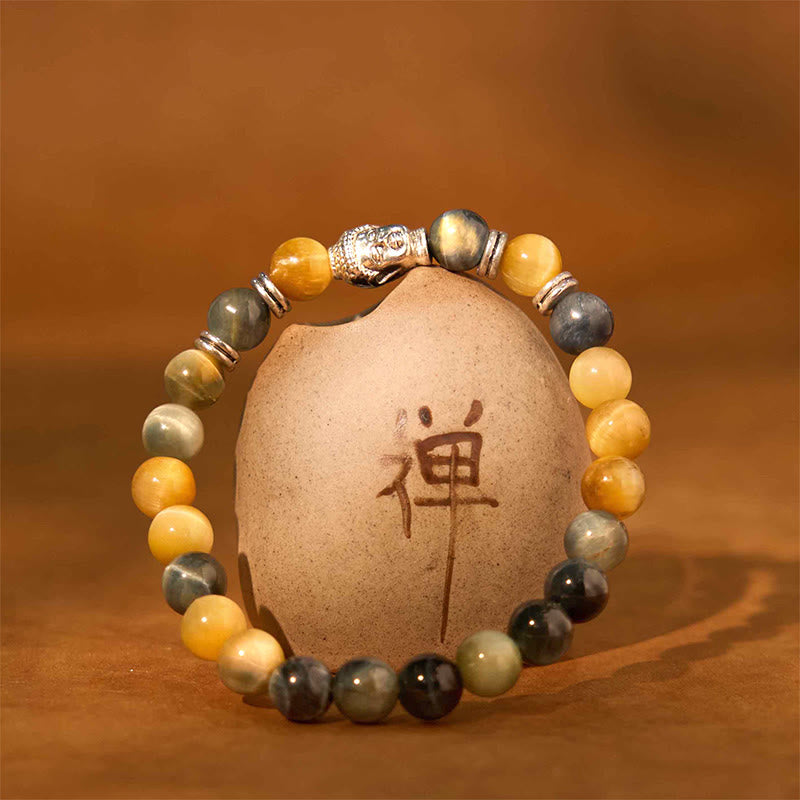 Pulsera de equilibrio con cabeza de Buda y ojo de tigre azul, verde y rojo con Buddha Stones