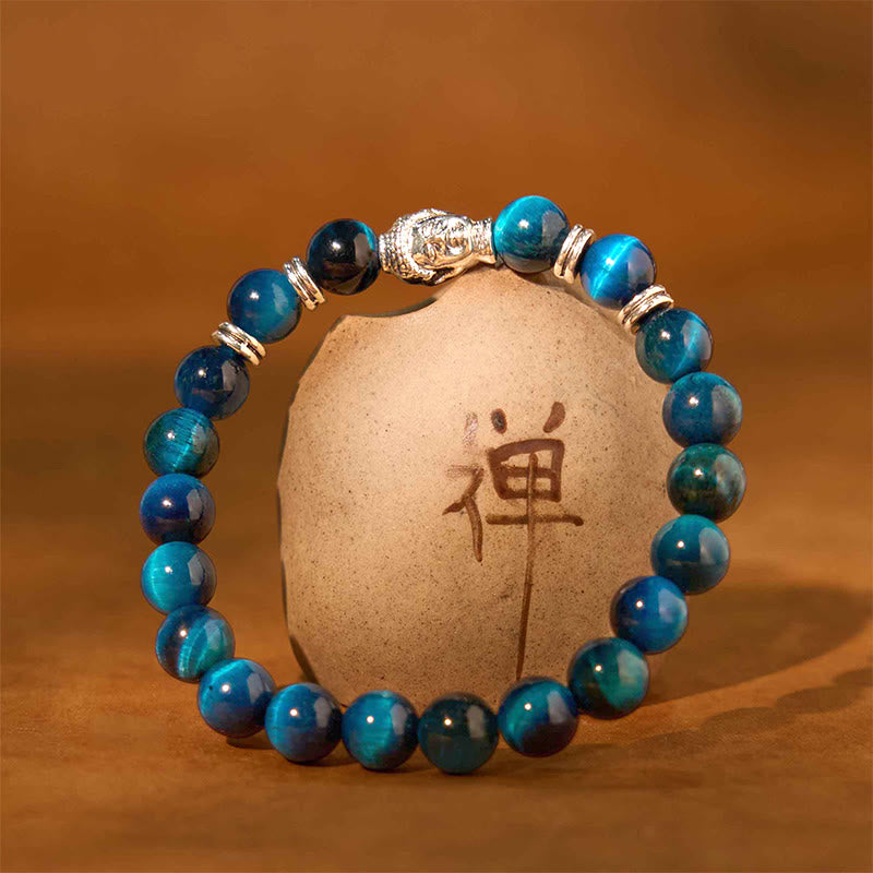 Pulsera de equilibrio con cabeza de Buda y ojo de tigre azul, verde y rojo con Buddha Stones