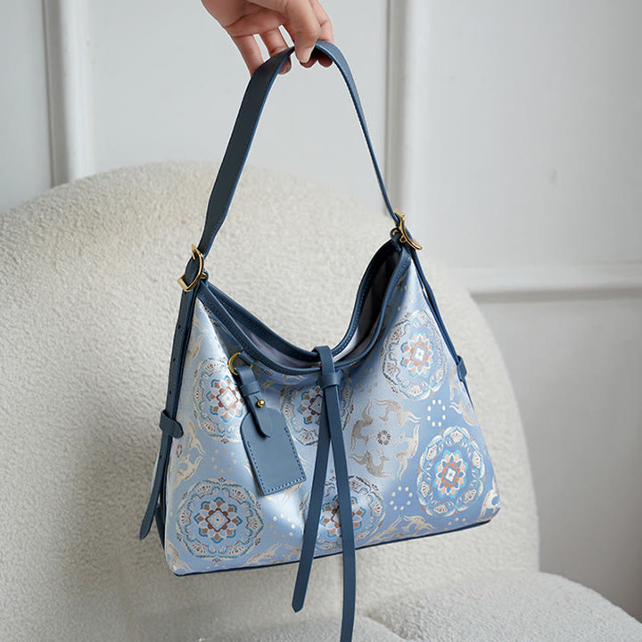 Bolso Buddha Stones con brocado hecho a mano con diseño de flores, grullas, ciervos y mariposas
