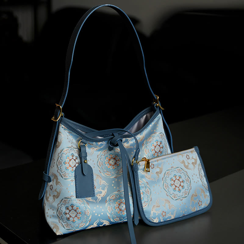 Bolso Buddha Stones con brocado hecho a mano con diseño de flores, grullas, ciervos y mariposas