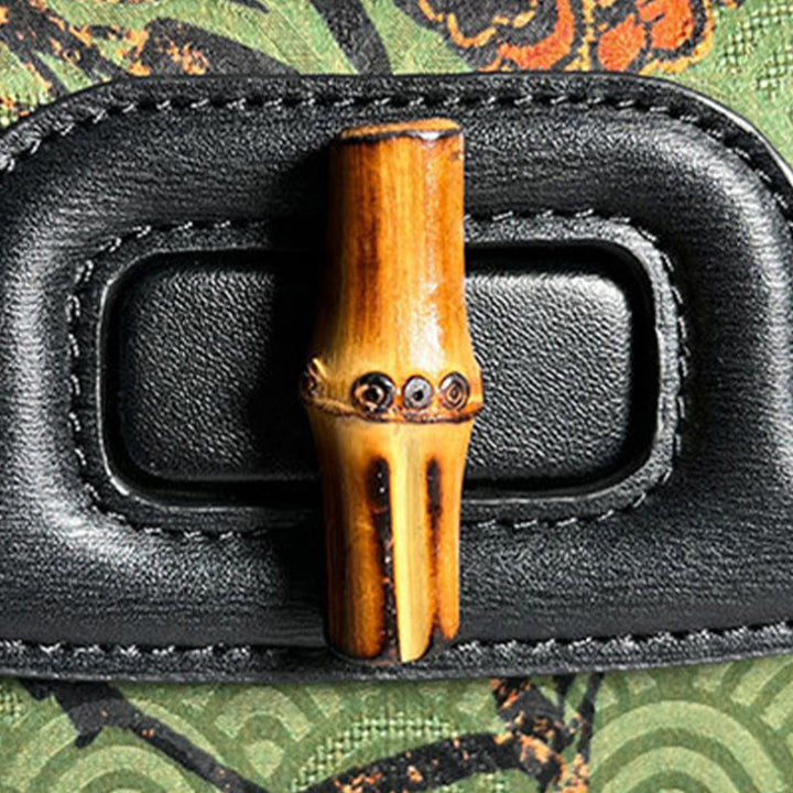 Bolso bandolera de seda Xiangyunsha con asa de bambú y flores Buddha Stones