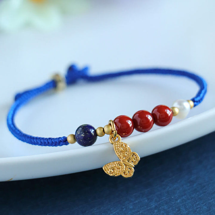 Pulsera con Buddha Stones, hilo azul Klein, ágata roja del sur, granate, aventurina azul, lazurita, lapislázuli, mariposa de cobre, carácter Fu positivo - image 0