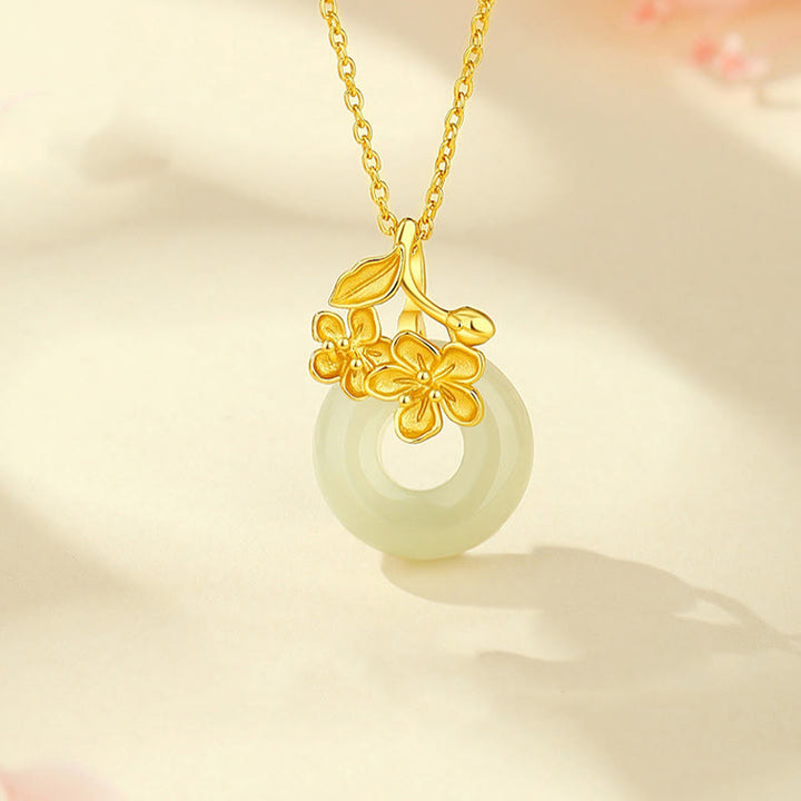 Colgante de plata de ley 999 con diseño de flor de durazno y hebilla de la paz con jade hetiano y Buddha Stones