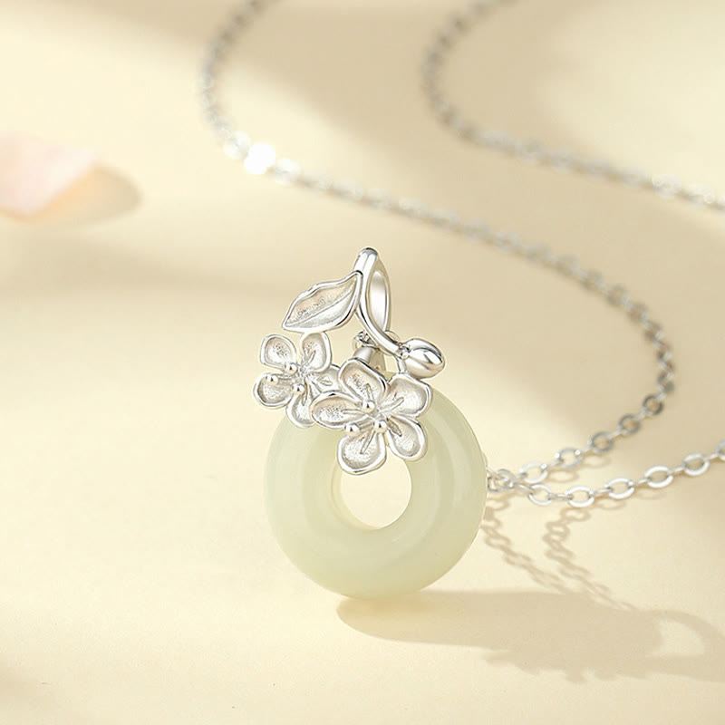 Colgante de plata de ley 999 con diseño de flor de durazno y hebilla de la paz con jade hetiano y Buddha Stones
