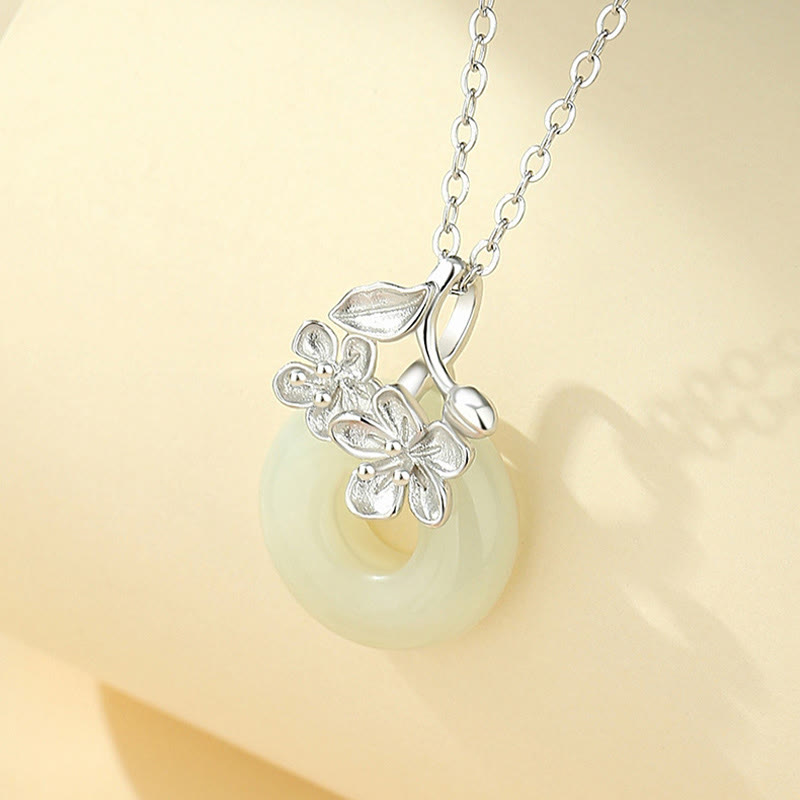 Colgante de plata de ley 999 con diseño de flor de durazno y hebilla de la paz con jade hetiano y Buddha Stones