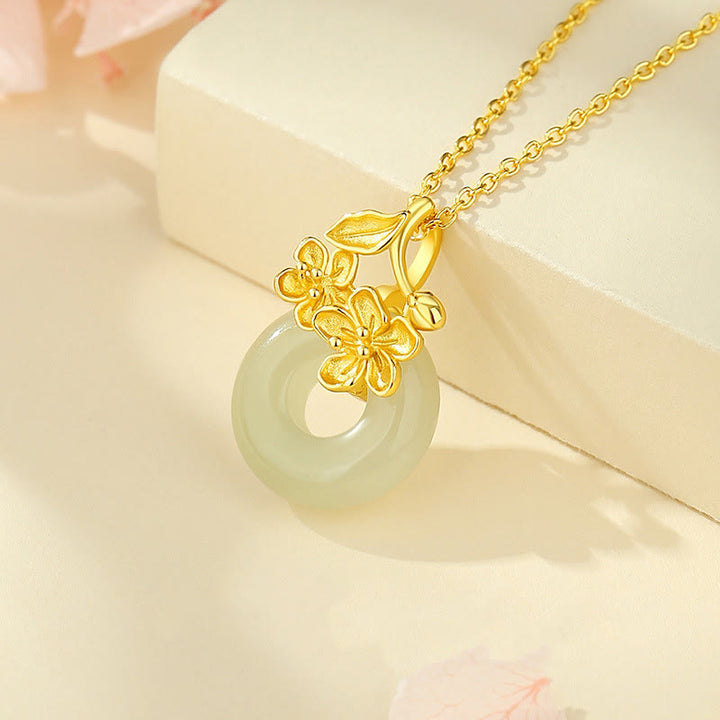 Colgante de plata de ley 999 con diseño de flor de durazno y hebilla de la paz con jade hetiano y Buddha Stones