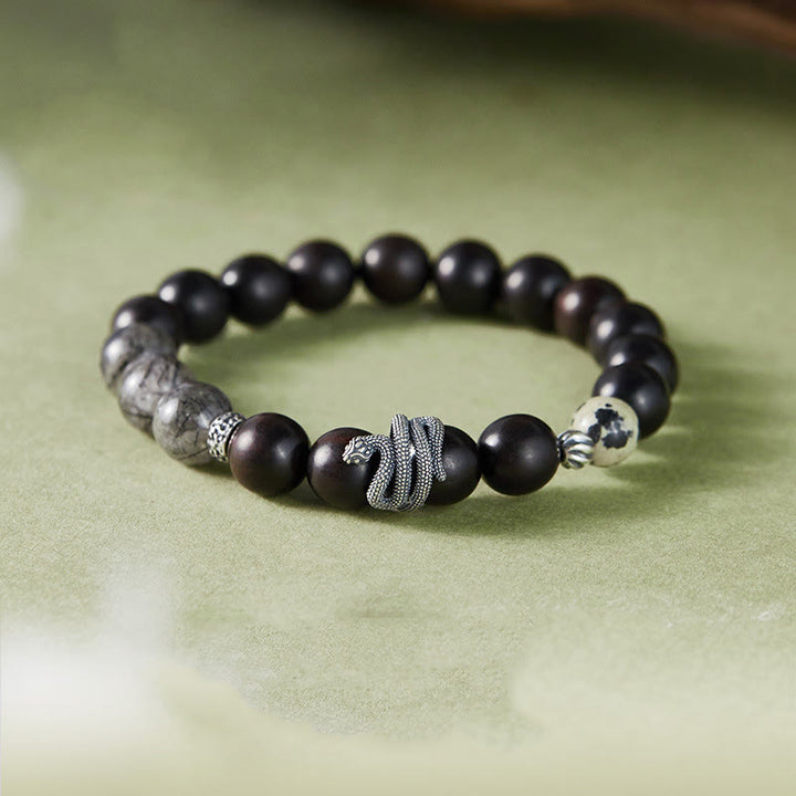 Pulsera de equilibrio del año de la serpiente con Buddha Stones, madera de ébano, cuarzo rutilado negro y plata de ley 925