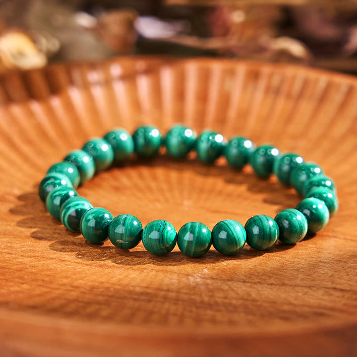Pulsera de la calma con piedra de Buda, varios cristales, malaquita, lazurita y hemimorfita