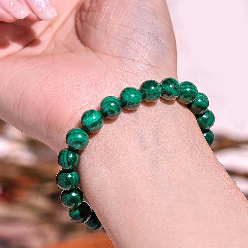Pulsera de la calma con piedra de Buda, varios cristales, malaquita, lazurita y hemimorfita