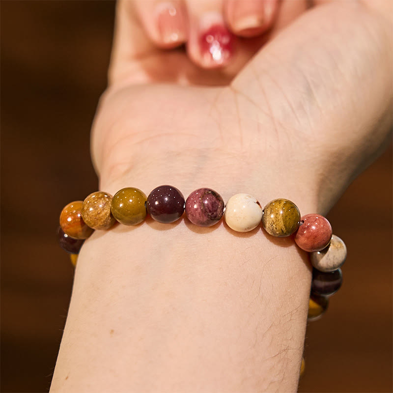 Pulsera de la calma con piedra de Buda, varios cristales, malaquita, lazurita y hemimorfita