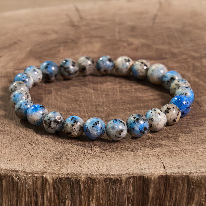 Pulsera de la calma con piedra de Buda, varios cristales, malaquita, lazurita y hemimorfita
