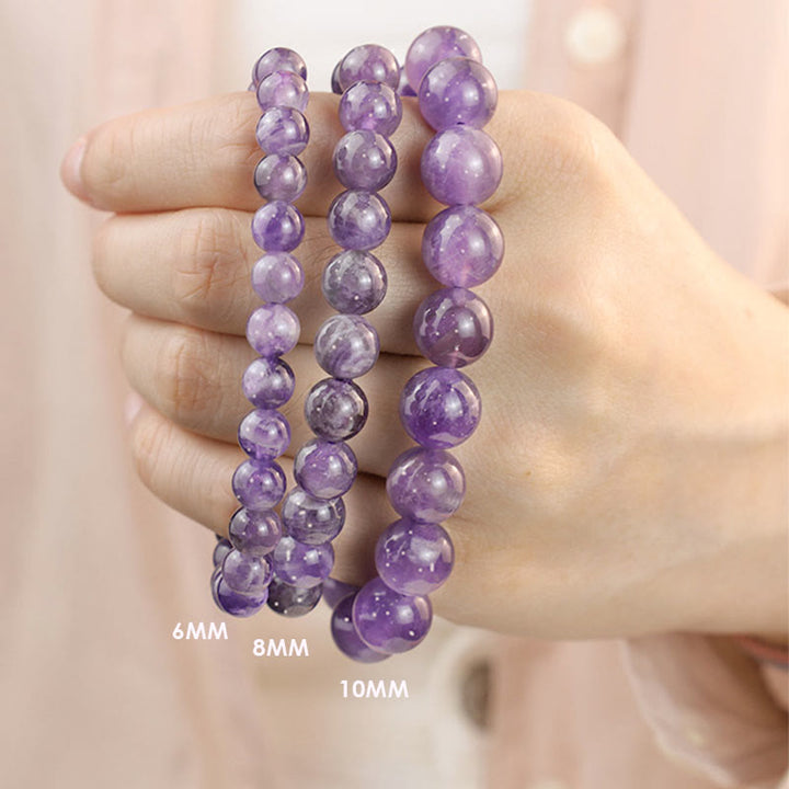 Pulsera de la calma con piedra de Buda, varios cristales, malaquita, lazurita y hemimorfita