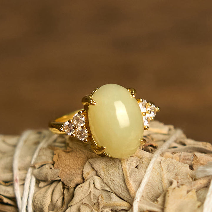 Anillo de aleación con forma de huevo de jade hetiano y Buddha Stones