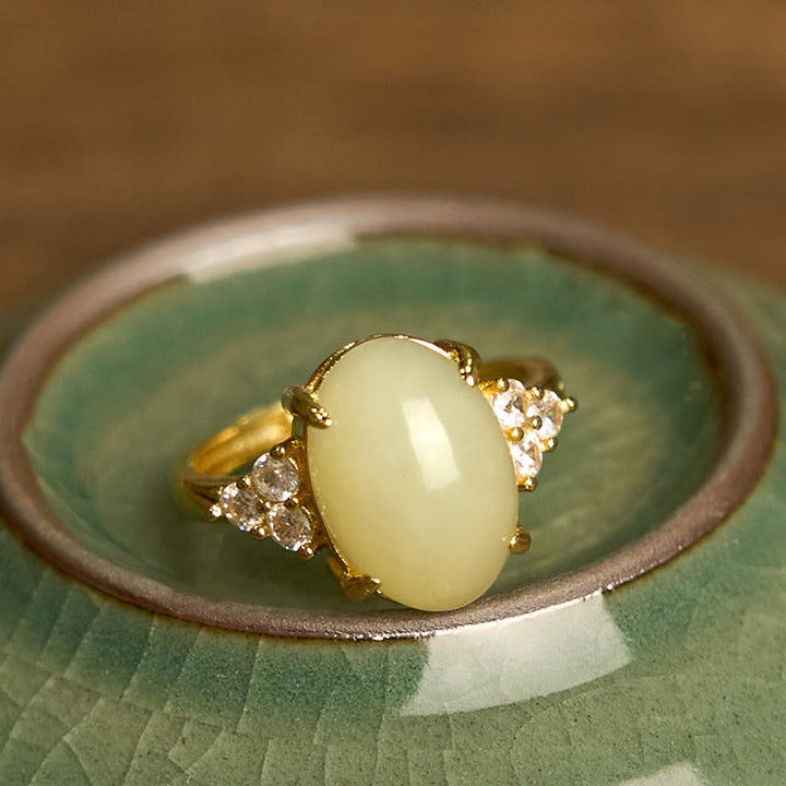 Anillo de aleación con forma de huevo de jade hetiano y Buddha Stones