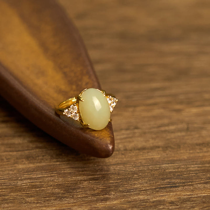 Anillo de aleación con forma de huevo de jade hetiano y Buddha Stones