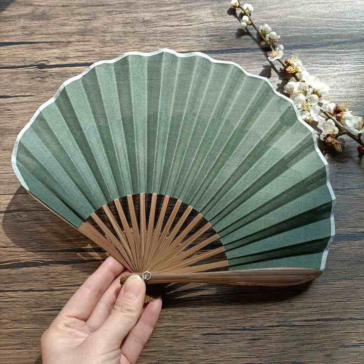 Abanico plegable de bambú de mano con forma de concha de color sólido retro con Buddha Stones