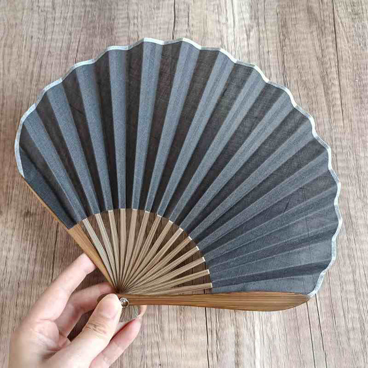 Abanico plegable de bambú de mano con forma de concha de color sólido retro con Buddha Stones