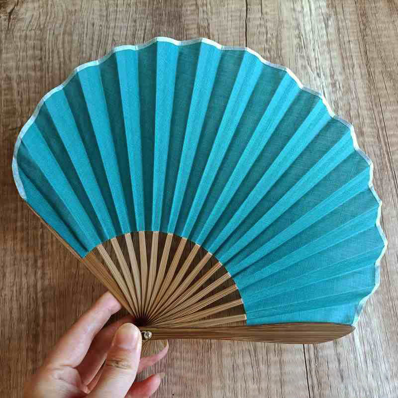 Abanico plegable de bambú de mano con forma de concha de color sólido retro con Buddha Stones
