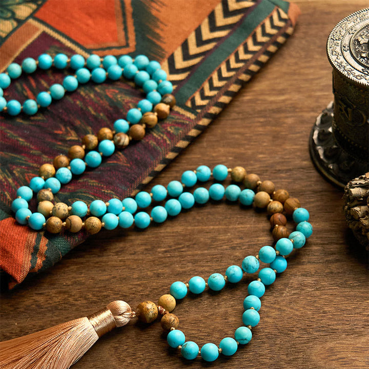 Pulsera de equilibrio con borlas y cuentas de jaspe con imagen turquesa y 108 cuentas de mala de Buddha Stones