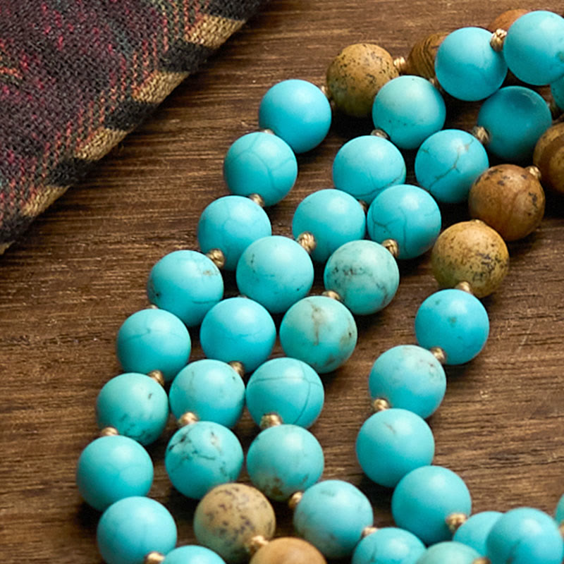 Pulsera de equilibrio con borlas y cuentas de jaspe con imagen turquesa y 108 cuentas de mala de Buddha Stones