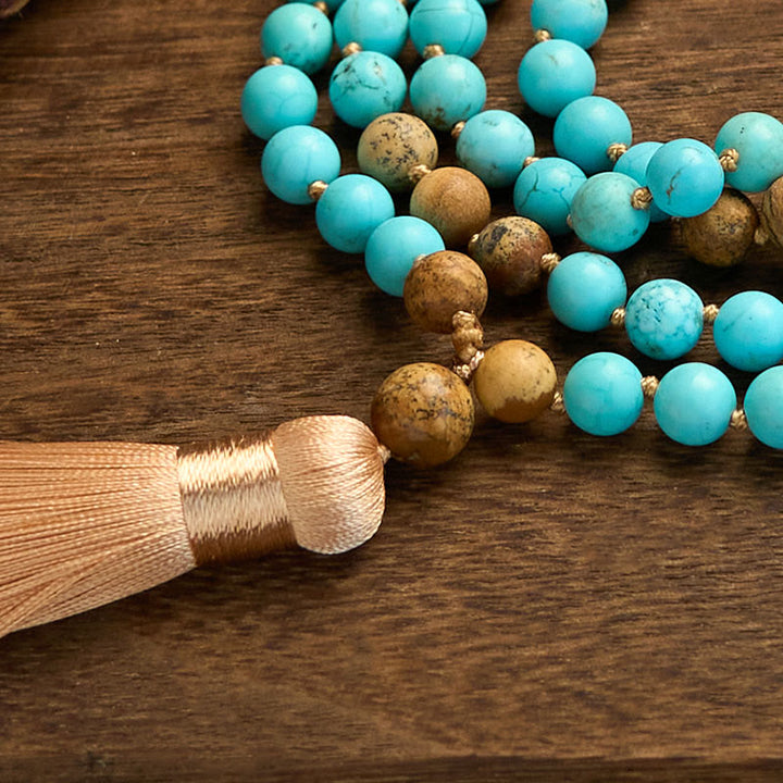 Pulsera de equilibrio con borlas y cuentas de jaspe con imagen turquesa y 108 cuentas de mala de Buddha Stones