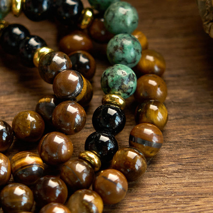 Pulsera de protección con borlas y cuentas de turquesa y ojo de tigre de piedra natural Mala 108 Buddha Stones