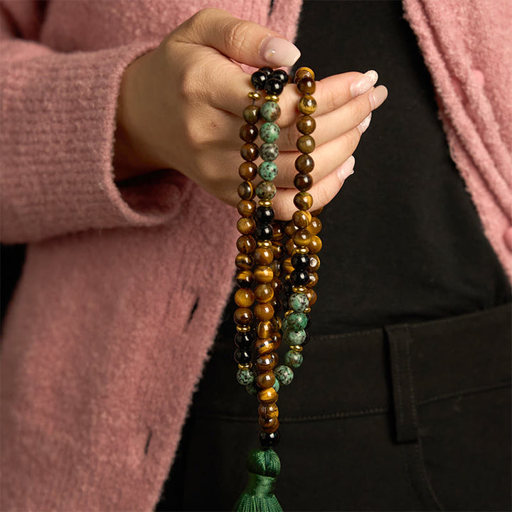 Pulsera de protección con borlas y cuentas de turquesa y ojo de tigre de piedra natural Mala 108 Buddha Stones